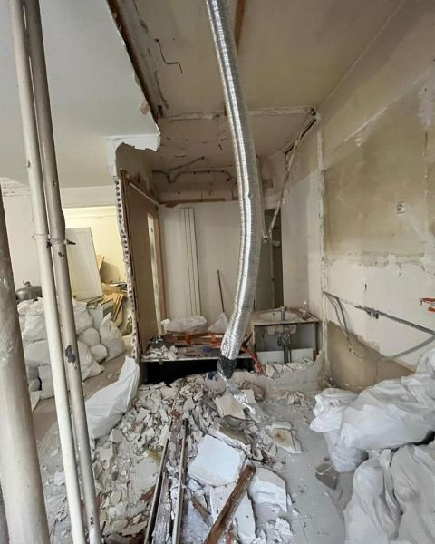 Réaménagement et rafraichissement d'un appartement parisien par Belmard Batiment