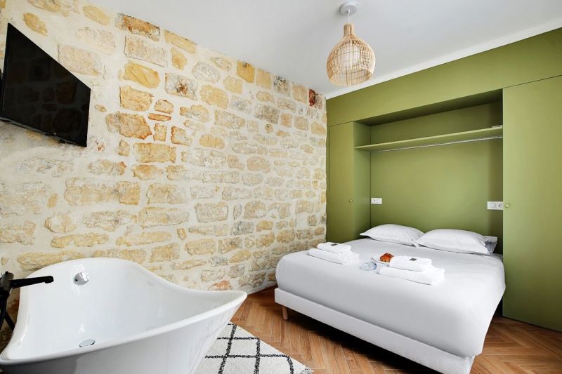 Créer un espace moderne dans un ancien immeuble à Paris 2