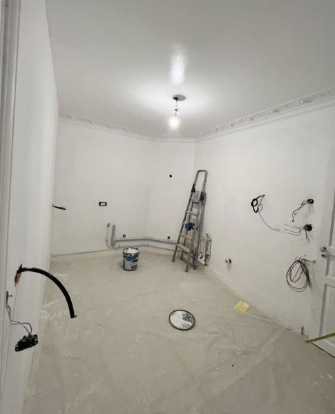 Séparation d'un espace cuisine pour créer une nouvelle chambre à Paris 7ème