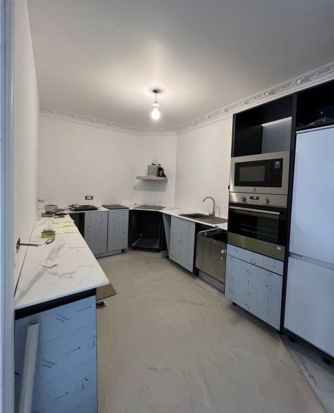 Séparation d'un espace cuisine pour créer une nouvelle chambre à Paris 7ème