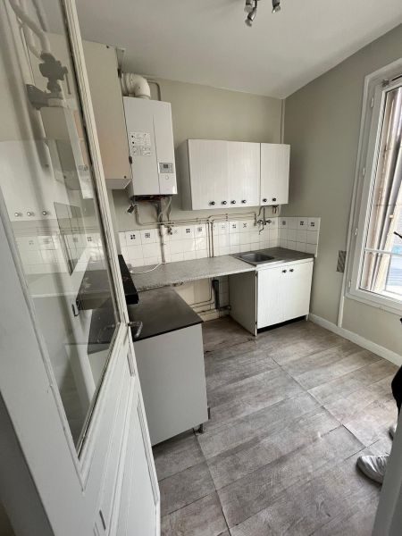 Rafraichissement élégant d'un appartement Haussmannien à Paris 14 par Belmard Batiment